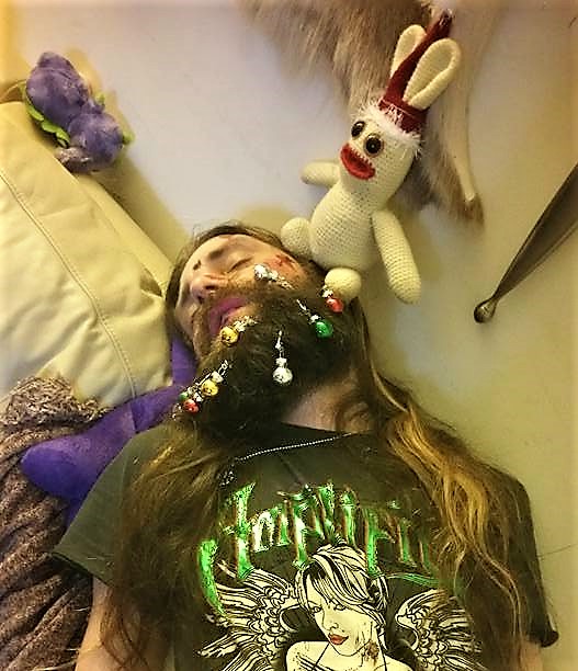 Seb says, "Oooh! Bananas Bunny forgot to send you this picture of him decorating our drunk friend on New Year's Eve! 😉"